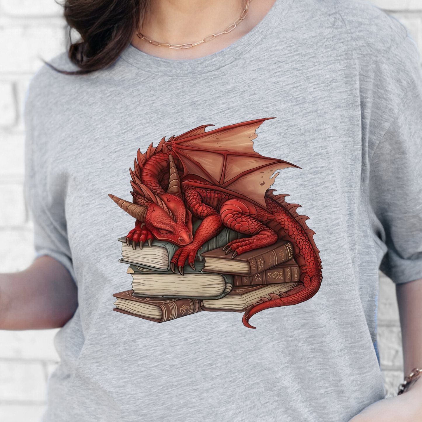 Dragon Sleeping on Books Graphic Tee
