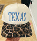 TEXAS Puff Embroidery in Dusty Blue on a natural and leopard hat